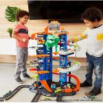Ultimativer Garagenangriff des T-Rex-Roboters, inklusive 2 Autos, Hot Wheels